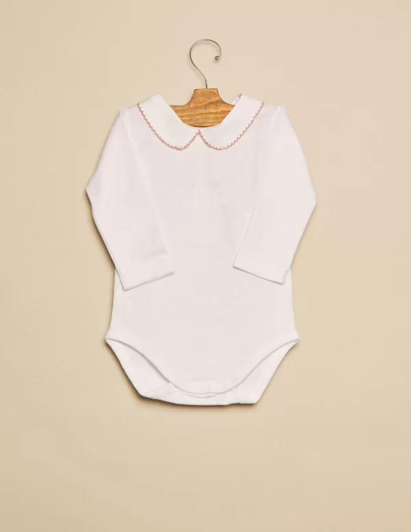 body_cuello_beb_pespuntes_0-3.webp NÍCOLI Body cuello bebé pespuntes rosa< Bodies