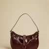 bolso_tachas_marrn_0.webp NÍCOLI BOLSO TACHAS MARRÓN< Bolsos