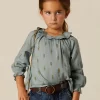 camisa_azul_flor_pequea_0-1.webp NÍCOLI CAMISA AZUL FLOR PEQUEÑA< Camisas