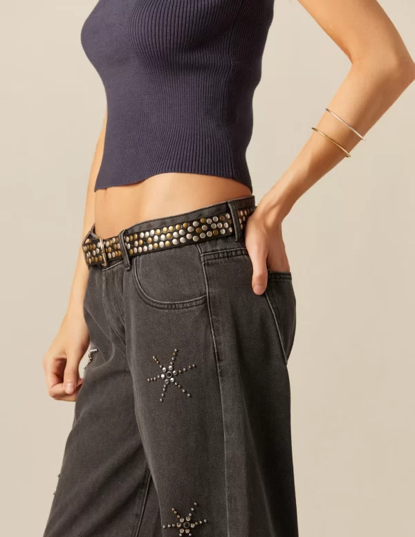 pantaln_tachas_soles_gris_1.webp NÍCOLI PANTALÓN TACHAS SOLES GRIS< Denim | Pantalones