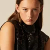 NÍCOLI TOP ANIMAL PRINT BRILLO< Tops